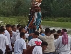 Ziarah di Ujung Harapan: Arak Arca Bunda Maria Menyebrangi Derasnya Kali Loworea